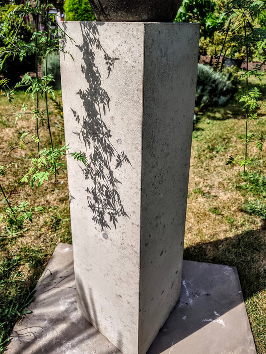 Stone display plinth for gardens or interior design 